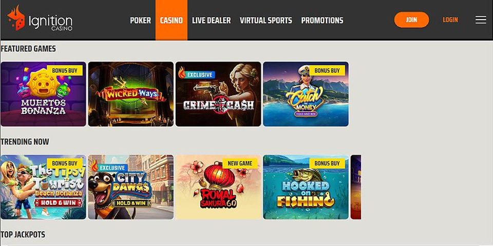 Ignition Casino lobby with the Featured Games and Trending Now rows, showing bonus-buy and exclusive slot titles